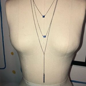3 tiered necklaces in various colors